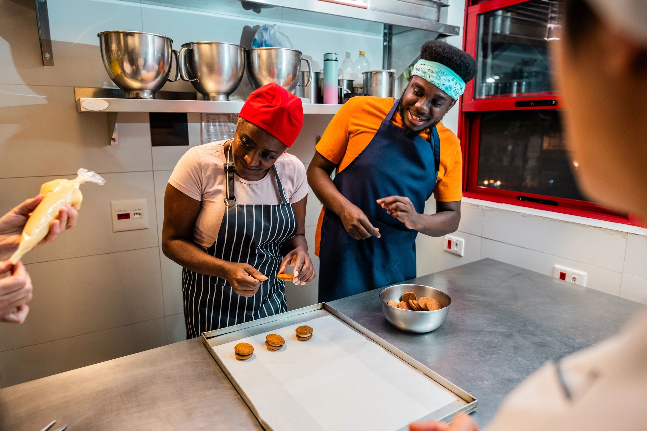Bakery team preparing sweet treats together